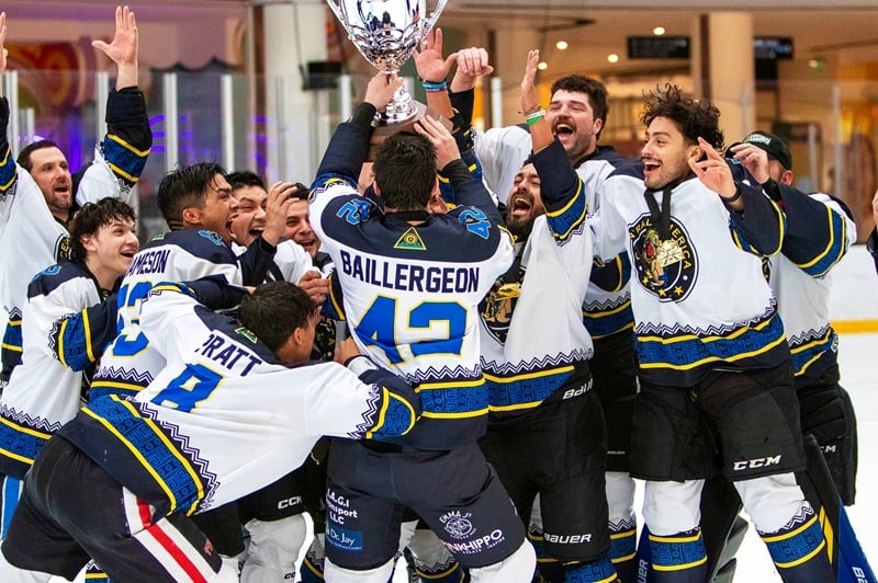 Champion hockey team wearing Dynasty Athletics uniforms